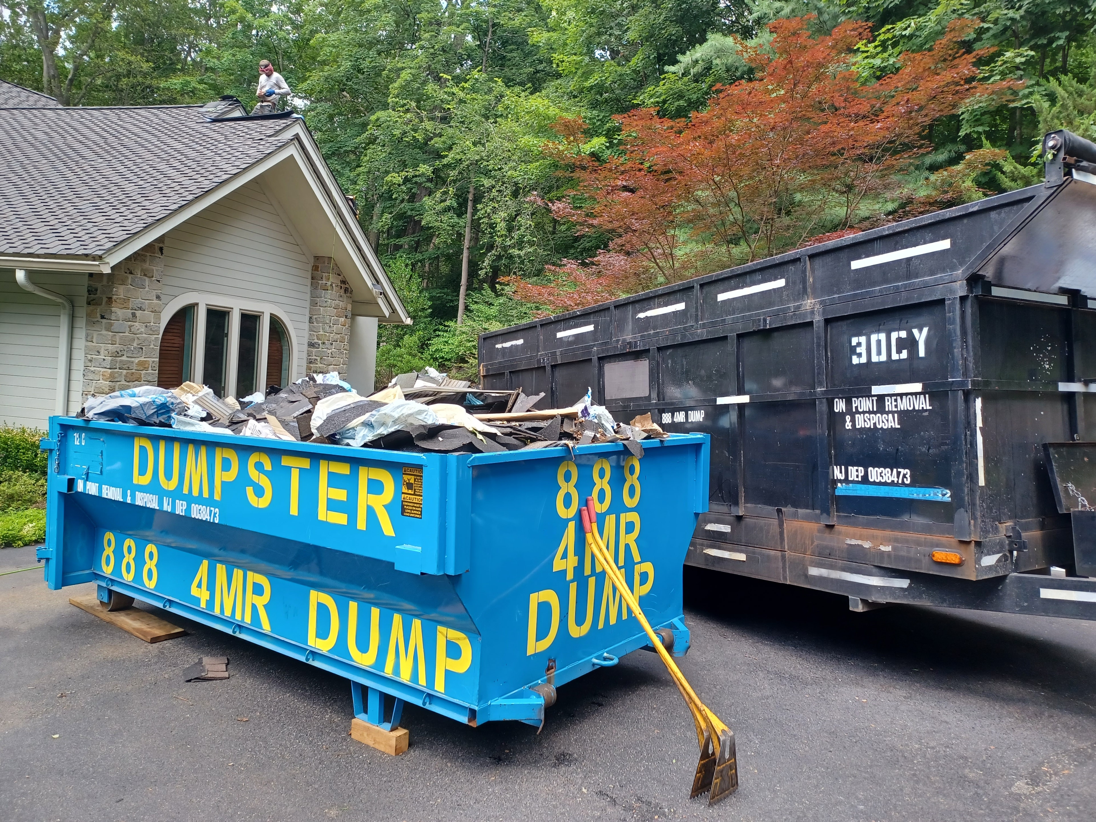 Driveway-safe dumpster for roofing debris removal in Mahwah NJ
