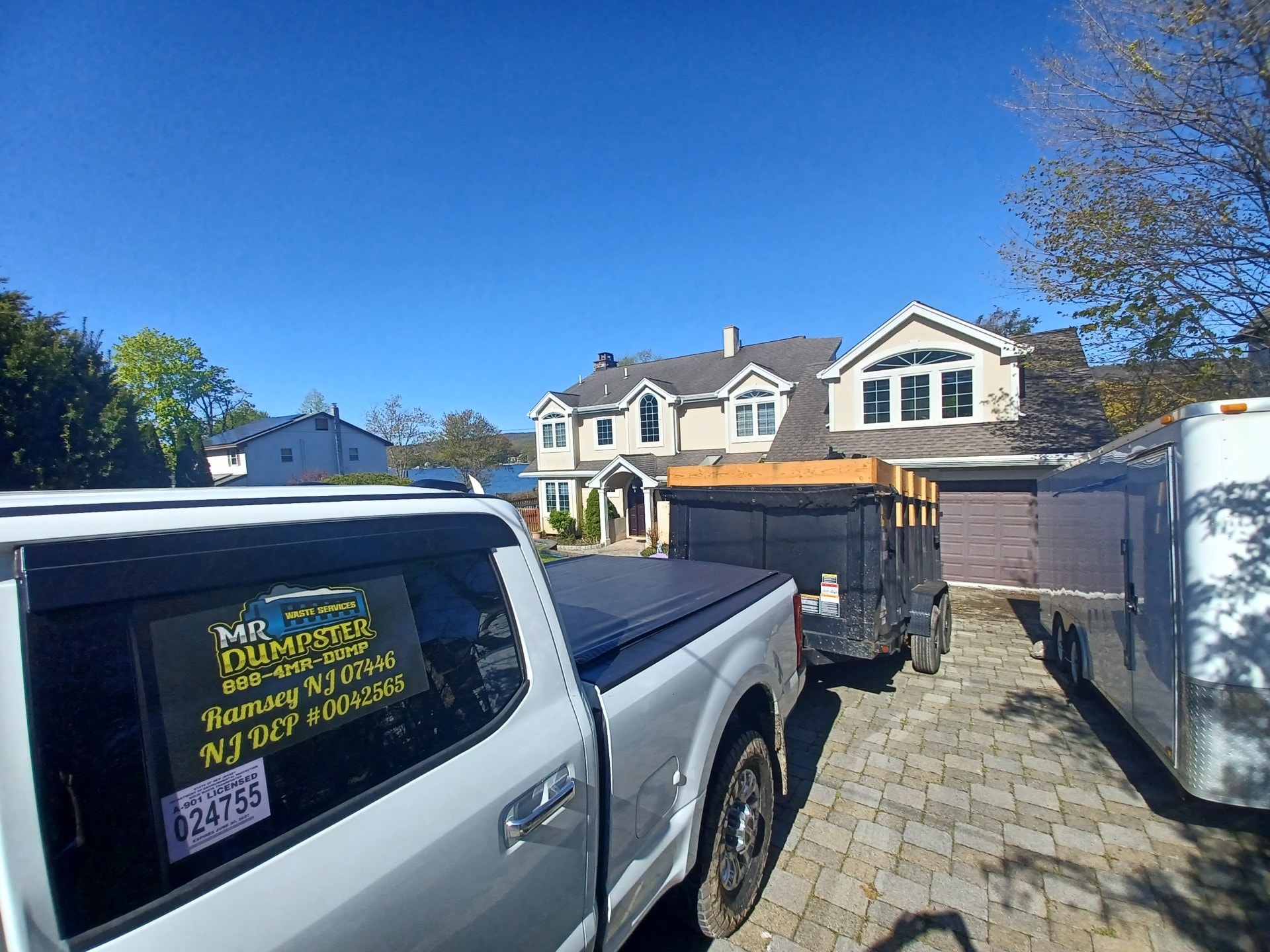 Driveway-safe dump trailer residential drop-off West Milford NJ 07480